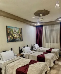 غرفة ثلاثية في فندق قصر الفارس